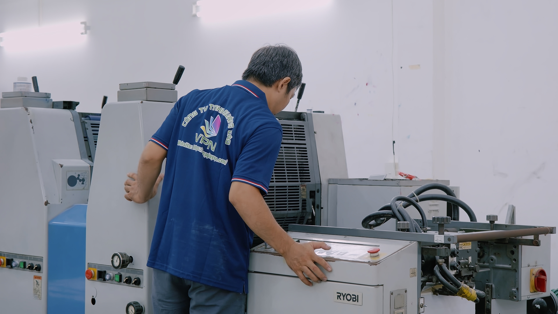 Workers producing packaging inside VPN Packaging Factory